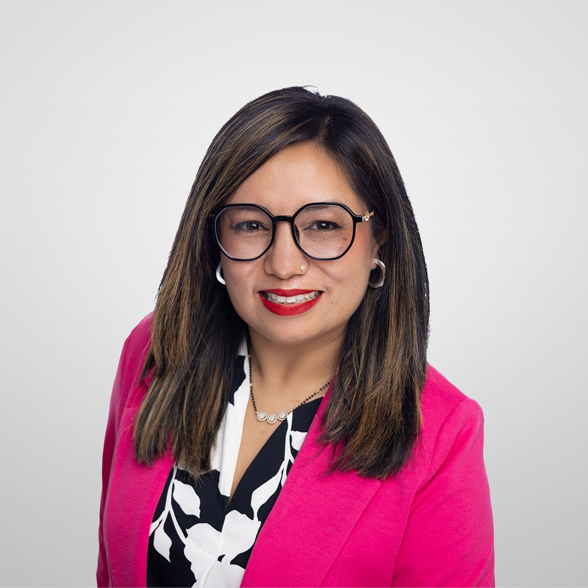 Professional headshot of Manita Thapa, ATBIM